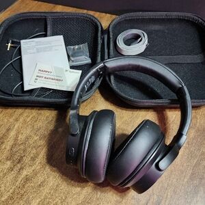 Noise-Canceling Headphones == Tao Tronics with Case and connector.